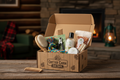 Critter Cabin Care Crate open and filled with pet grooming essentials, toys, and treats